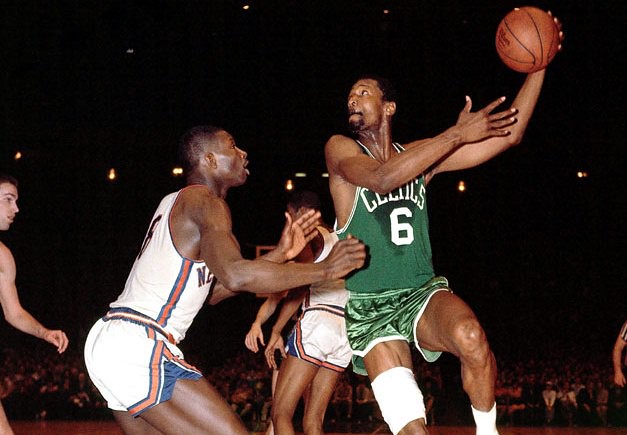 On this day in 1958 Bill Russell (right) grabbed 41 rebounds in a game