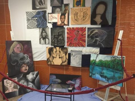 CHS art students usually showcase their work in the school lobby multiple times per year. The AP art students normally have the opportunity to put an exhibit together like the one seen in this photo.