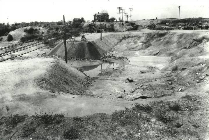 The Metuchen Ave Clay pits are now where Woodbridge Mall stands. It was near the Maple Hill Dairy Farm which no longer exists.