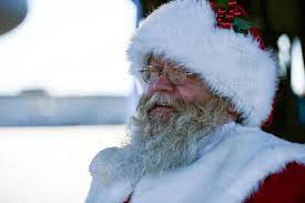 Pictured is a standard depiction of Santa Claus. His name originates from the Dutch name for Saint NIcholas, Sinter Klaas. 