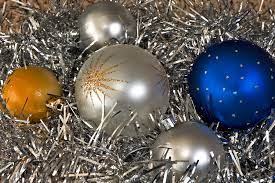 Pictured is a current adaptation of tinsel, made of plastic. Original tinsel was made of silver. 