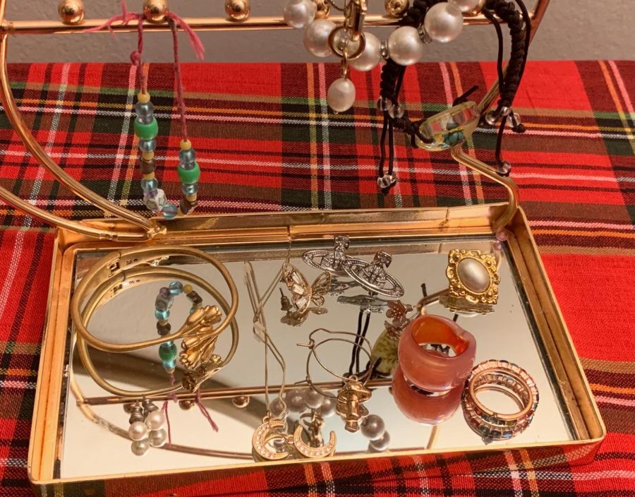 Assortment of funky jewelry displayed.