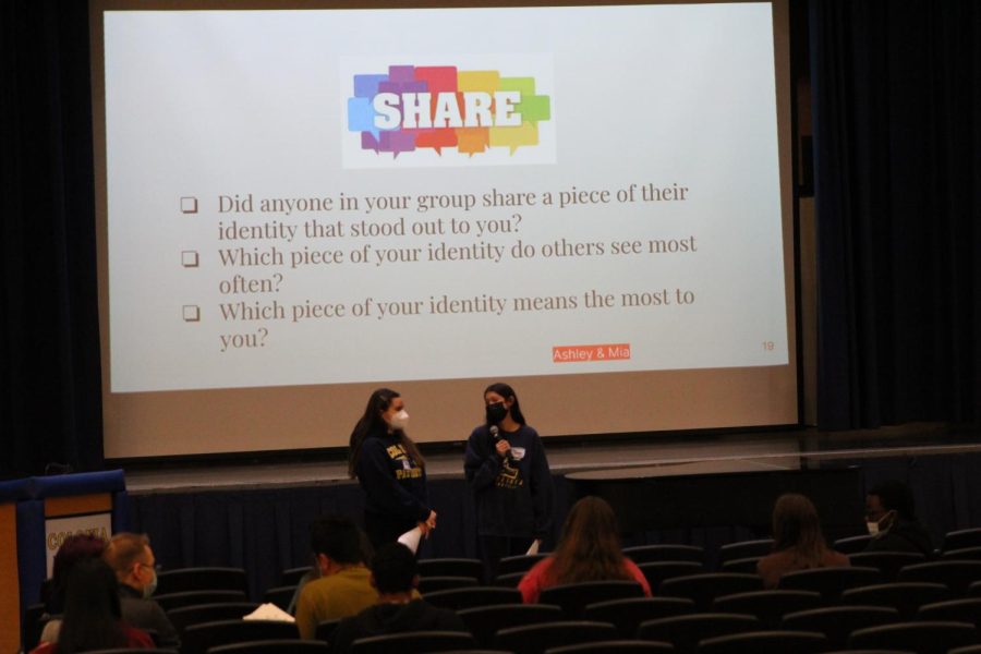 Ashley Massano and Mia Cardenas speaking at the Day of Dialogue event about self identity.