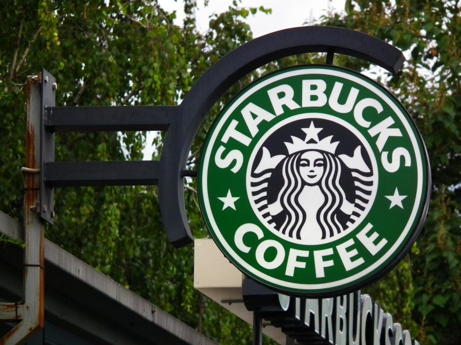 Pictured is the traditional Starbucks logo featuring a mermaid. This logo has remained the same since the company opened. 