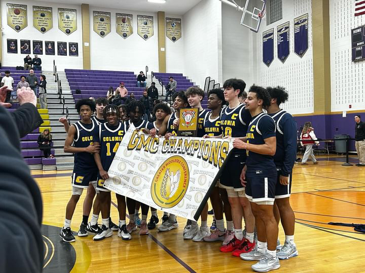Colonia vs. St. Thomas Aquinas on March 16, 2024. Moments after the fresh win against STA the Patriots received their banner. 