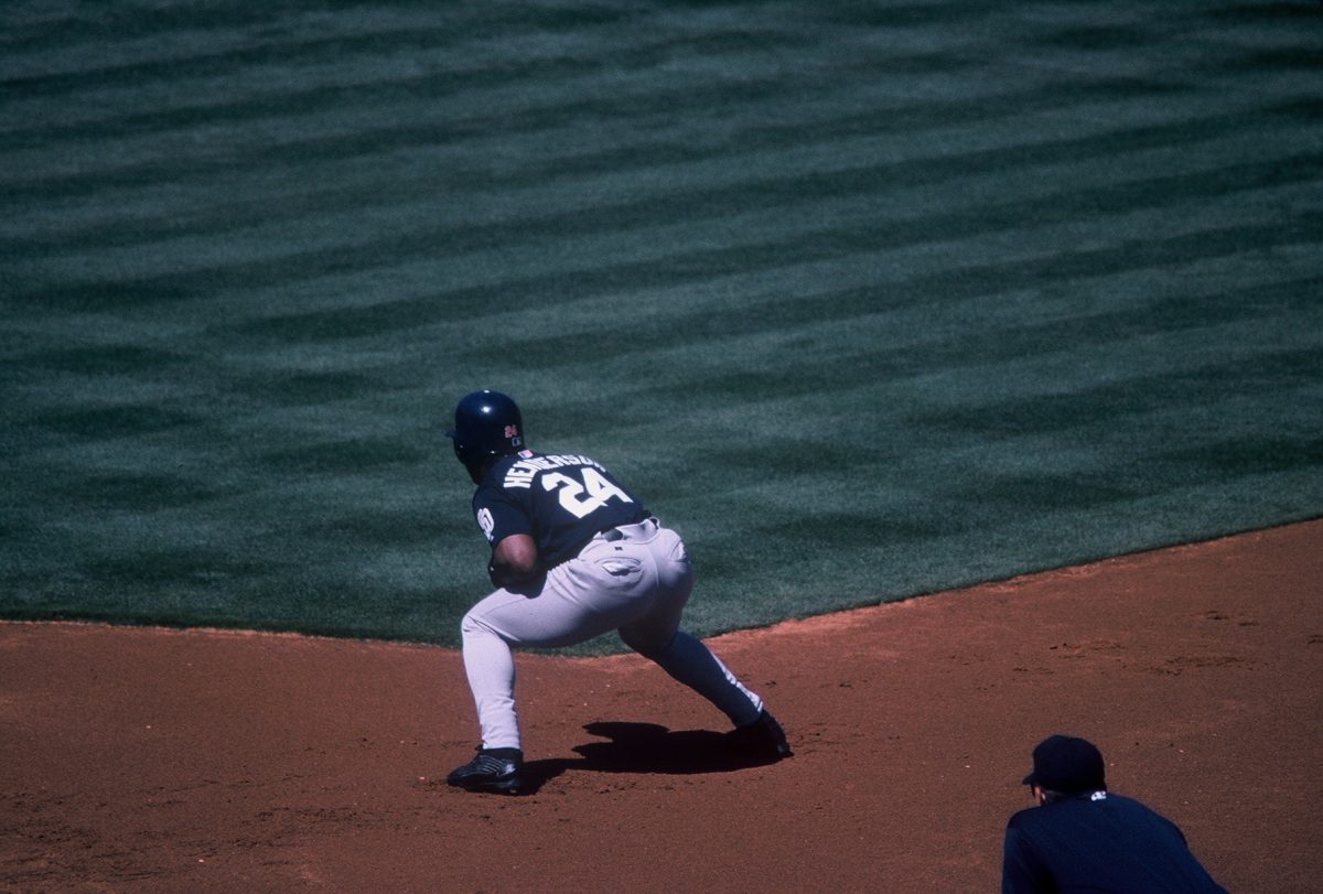 Rickey_Henderson_crouching_at_first_for_the_San_Diego_Padres_(37575490516)