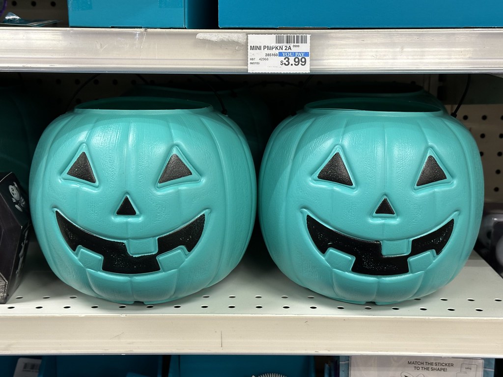 Some children may carry a colored pumpkin to make homeowners aware of their circumstances. However, some homeowners may put a colored pumpkin on their stoop to let trick or treaters know it is safe to get treats here.