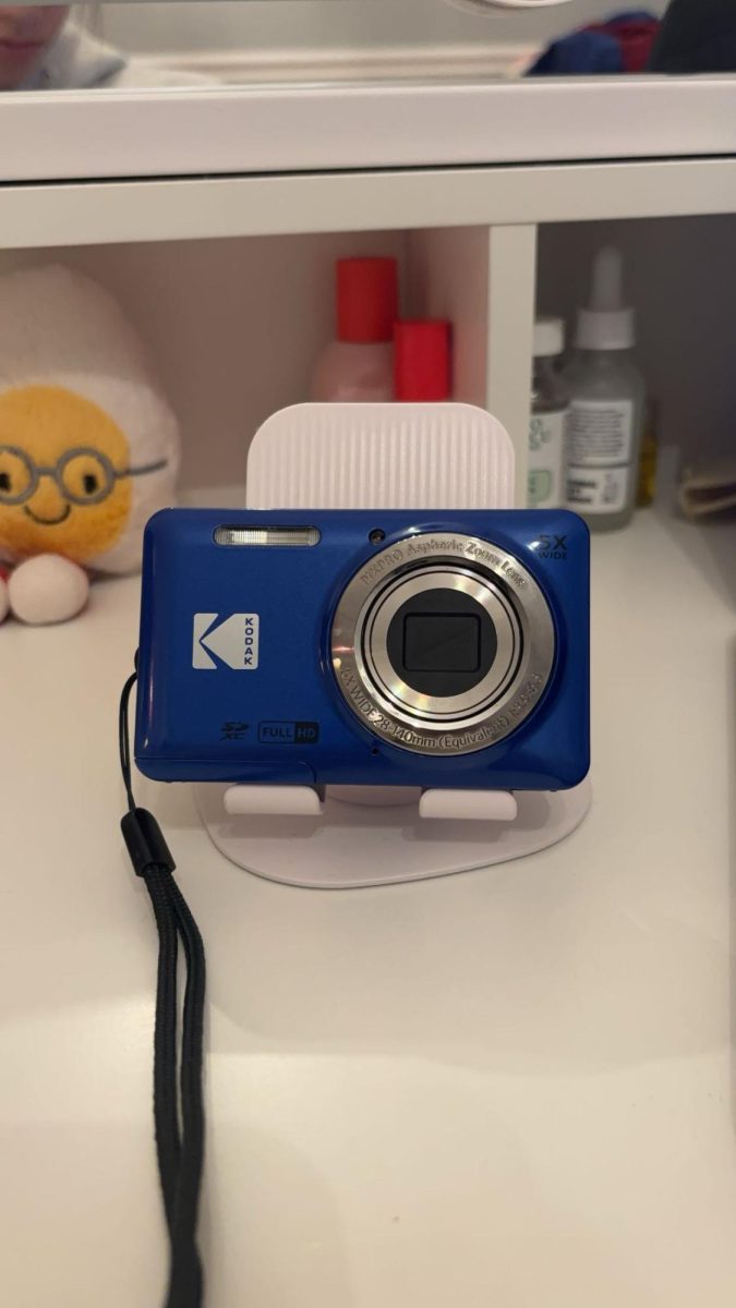 Kodak Pixpro digital camera in blue. This camera cost 120 dollars on Amazon.com. 