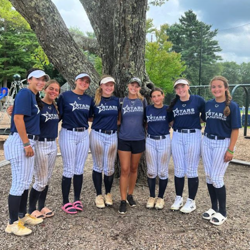 Softball players from NJ Stars Fastpitch Scolaro 18u pose for a photo together after their games. Majority of the girls are future college athletes. 