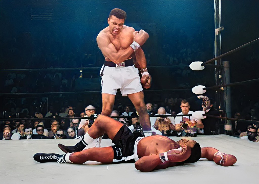 Shocking the world is Muhammed Ali as he dethrones former boxing heavyweight champion Sonny Liston 