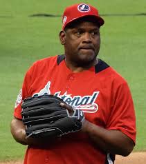 Raines was a left fielder. He is now 66. 