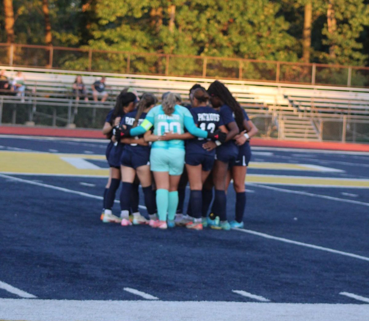 On and off the soccer field, the Lady Patriots can feel their camaraderie. The coach work hard to build that support system as do the players who welcome it. 