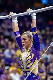 Dunne in her gymnastic uniform 